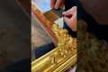 Laying gold leaf on a handmade frame